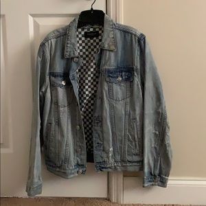 Light denim jean jacket.